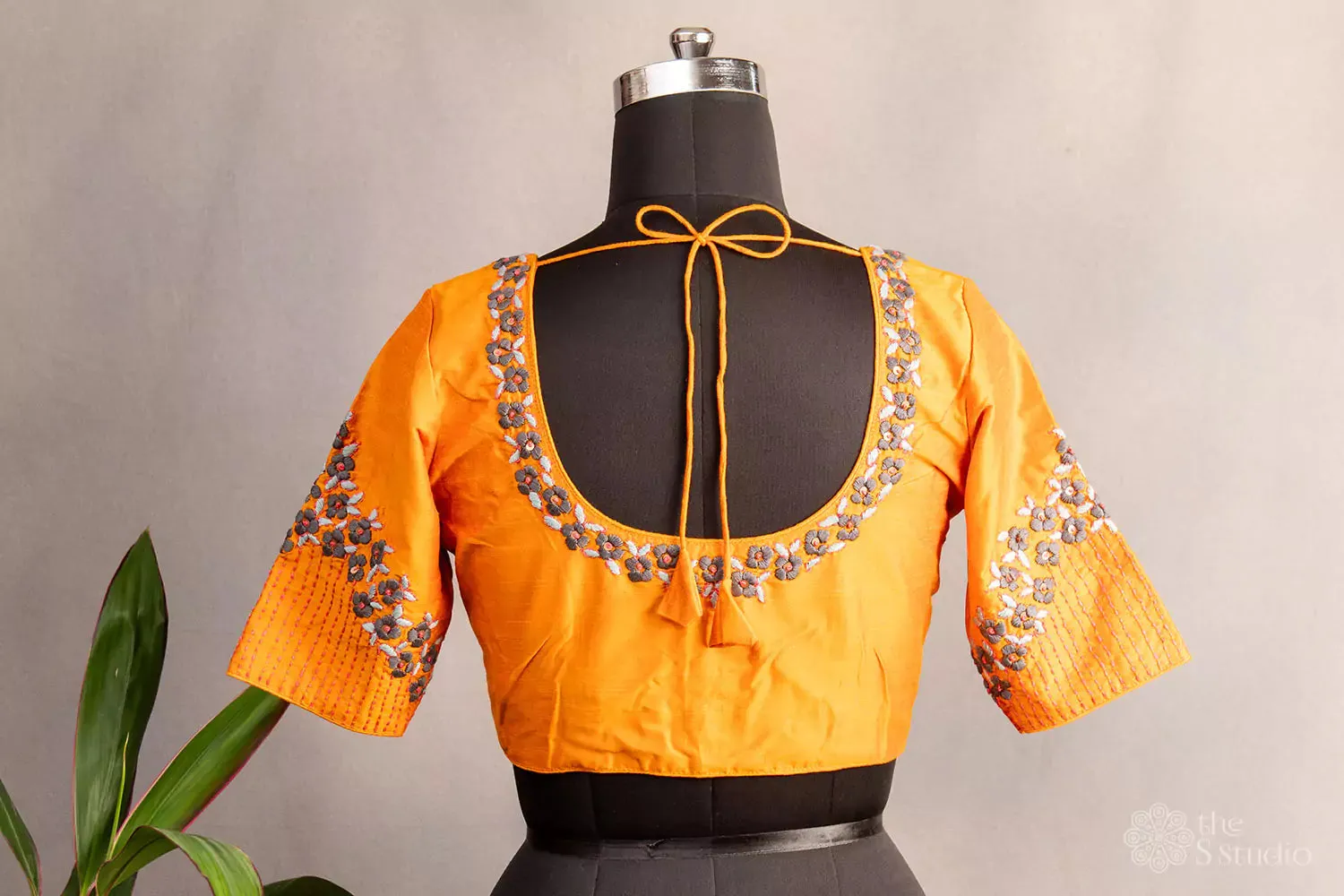 Orange hand  embroidered raw silk blouse with neck pattern